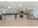 Bright, open kitchen features stainless steel appliances, granite counters, and ample cabinet space at 1862 Shelby Ter, Deltona, FL 32725