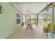 The outdoor patio area featuring outdoor seating and views of the backyard at 1862 Shelby Ter, Deltona, FL 32725