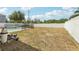 Large backyard with an in-ground pool and fencing at 193 Fish Hawk Dr, Winter Haven, FL 33884