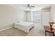 Cozy bedroom featuring carpet, a ceiling fan, and double door closets at 193 Fish Hawk Dr, Winter Haven, FL 33884