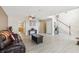 Spacious living room features wood-look floors, fan, and natural light, creating a welcoming space at 193 Fish Hawk Dr, Winter Haven, FL 33884