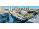 Aerial view of community with ocean, recreational area, parking, and buildings at 2 Oceans West Blvd # 1007, Daytona Beach, FL 32118