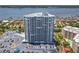 Striking exterior shot of a high-rise condo building with panoramic views of the marina at 2 Oceans West Blvd # 1007, Daytona Beach, FL 32118