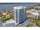 High-rise condo exterior with golf course and marina bay views at 2 Oceans West Blvd # 1007, Daytona Beach, FL 32118