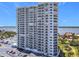 Exterior view of a high-rise condo featuring a wall of windows and balconies with scenic views at 2 Oceans West Blvd # 1007, Daytona Beach, FL 32118