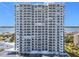 Detailed exterior of a high-rise condo showcasing balconies and stunning waterfront views at 2 Oceans West Blvd # 1007, Daytona Beach, FL 32118