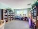 Cozy library featuring shelves stocked with books, creating a quiet and inviting reading space at 2 Oceans West Blvd # 1007, Daytona Beach, FL 32118