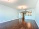 Open floor plan featuring hardwood floors throughout and modern lighting at 2 Oceans West Blvd # 1007, Daytona Beach, FL 32118