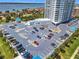 Ample parking surrounds this high-rise condo, set against a backdrop of lush greenery and bay views at 2 Oceans West Blvd # 1007, Daytona Beach, FL 32118
