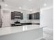 Spacious kitchen with stainless steel appliances, granite countertops, and a large island at 200 S Montgomery Ave, Deland, FL 32720