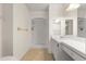 An all-white bathroom with shower at 207 Pine Cone Trl, Ormond Beach, FL 32174