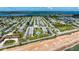 Scenic aerial view of the Ormond Breakers Condominium complex with a refreshing pool near the ocean at 2100 Ocean Shore Blvd # 1120, Ormond Beach, FL 32176