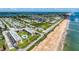 Expansive aerial view showcasing the proximity of the Ormond Breakers Condominium to the beach at 2100 Ocean Shore Blvd # 1120, Ormond Beach, FL 32176
