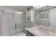 Well lit bathroom features a tub, shower, and a vanity with lots of storage at 2100 Ocean Shore Blvd # 1120, Ormond Beach, FL 32176