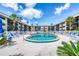 Inviting pool area with plenty of lounge chairs and umbrellas at Ormond Breakers Condominium at 2100 Ocean Shore Blvd # 1120, Ormond Beach, FL 32176