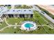 Charming pool area with ample seating and lush greenery, Ormond Breakers Condominium at 2100 Ocean Shore Blvd # 1120, Ormond Beach, FL 32176