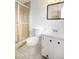 Bathroom featuring white vanity, toilet and shower at 2126 Sabal Palm Dr, Edgewater, FL 32141