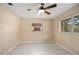Bedroom with tile flooring, windows for natural light and view at 2126 Sabal Palm Dr, Edgewater, FL 32141