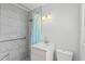 Updated bathroom with a walk-in shower and modern vanity at 2144 Brian Ave, South Daytona, FL 32119
