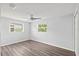 Bedroom with natural light, ceiling fan, and neutral color palette at 2144 Brian Ave, South Daytona, FL 32119