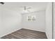 Well-lit, minimalist bedroom with hardwood floors and one window at 2144 Brian Ave, South Daytona, FL 32119