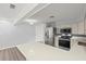 Bright kitchen featuring stainless steel appliances, a modern backsplash, and an island at 2144 Brian Ave, South Daytona, FL 32119