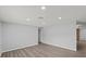 Open living room featuring stylish wood floors and neutral paint at 2144 Brian Ave, South Daytona, FL 32119