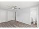 Spacious main bedroom features ensuite bathroom and ample closet space at 2144 Brian Ave, South Daytona, FL 32119