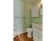 Standard bathroom features a toilet, vanity with storage, and a medicine cabinet at 2214 Danforth Ave, Deltona, FL 32738