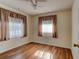 Bedroom with wood floors, natural light, and neutral wall color at 2214 Danforth Ave, Deltona, FL 32738