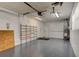 Well-lit garage with built-in shelving and visible water heater at 2214 Danforth Ave, Deltona, FL 32738