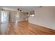 Inviting living room showcasing wood-look floors and an open layout at 2214 Danforth Ave, Deltona, FL 32738