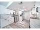 Bright kitchen with stainless steel appliances, marble countertops, and subway tile backsplash at 2254 Green St, South Daytona, FL 32119