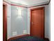 Apartment hallway with doors and lighting at 231 Riverside Dr # 2310, Holly Hill, FL 32117