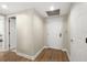 Entryway with wood floor leading to living room and bedroom at 231 Riverside Dr # 2310, Holly Hill, FL 32117