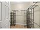 Spacious walk-in closet with custom shelving units for optimal storage and organization at 231 Riverside Dr # 2310, Holly Hill, FL 32117
