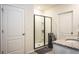 Bathroom featuring a glass-enclosed shower, granite countertops, and neutral color palette at 258 Sandoval Dr, Ormond Beach, FL 32174