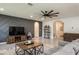 Spacious living room with decorative wall, ceiling fan, and neutral color palette at 258 Sandoval Dr, Ormond Beach, FL 32174