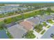 Aerial view showing the layout of houses with manicured lawns in a residential neighborhood at 2672 Star Coral Ln, New Smyrna Beach, FL 32168