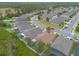 Overhead view of a well-planned neighborhood with neatly arranged houses, yards, and curving streets at 2672 Star Coral Ln, New Smyrna Beach, FL 32168