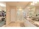 Beautiful bathroom featuring a large glass shower, walk in closet and granite countertop at 2672 Star Coral Ln, New Smyrna Beach, FL 32168