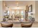 Eat-in kitchen features granite countertops, stainless steel appliances and adjacent dining area with bright natural light at 2672 Star Coral Ln, New Smyrna Beach, FL 32168