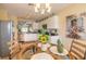 This kitchen features stainless steel appliances, white cabinetry, tile flooring and eat in kitchen at 2672 Star Coral Ln, New Smyrna Beach, FL 32168