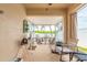 The spacious patio offers two separate seating areas with a bright screened-in porch beyond at 2672 Star Coral Ln, New Smyrna Beach, FL 32168