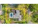 Aerial view of the property showcasing its layout and outdoor space with a pool at 28 Shadowcreek Way, Ormond Beach, FL 32174