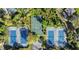 Aerial shot of community tennis and basketball courts, provides residents with recreational facilities at 28 Shadowcreek Way, Ormond Beach, FL 32174