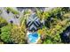 Top-down aerial shot of community building and pool at 28 Shadowcreek Way, Ormond Beach, FL 32174