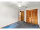 Cozy bedroom with light walls, carpet, ceiling fan and closet at 28 Shadowcreek Way, Ormond Beach, FL 32174