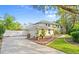 Two car garage with a driveway at 28 Shadowcreek Way, Ormond Beach, FL 32174