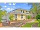 Lovely home with a white garage and large driveway at 28 Shadowcreek Way, Ormond Beach, FL 32174